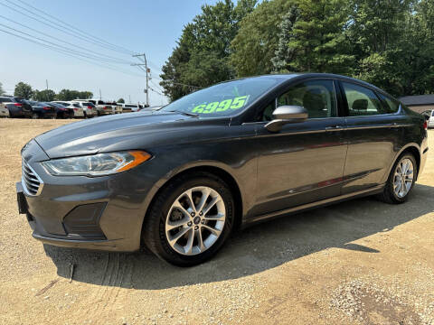 2019 Ford Fusion for sale at Northwoods Auto & Truck Sales in Machesney Park IL