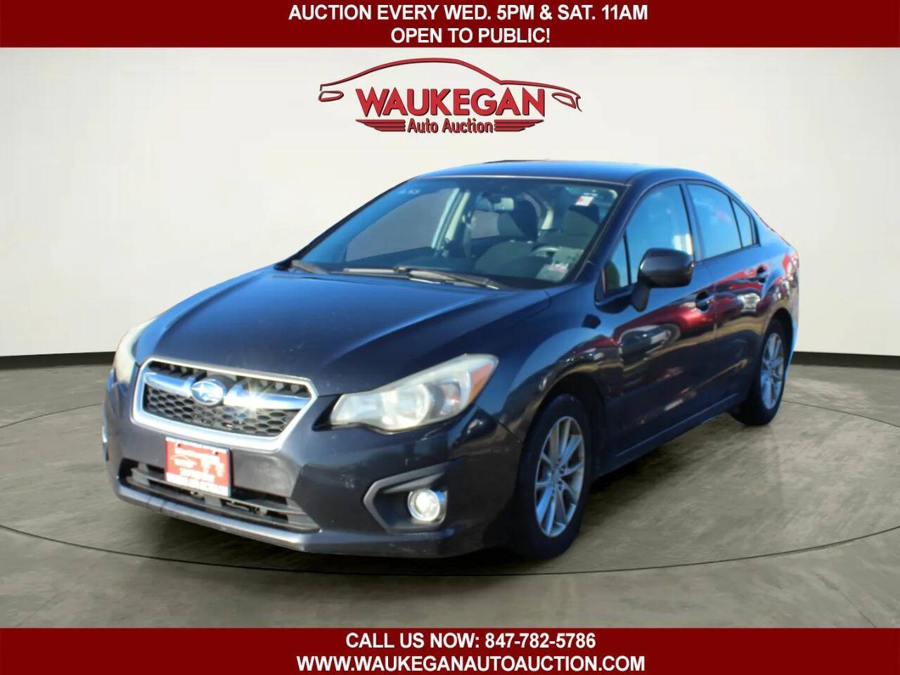 2012 Subaru Impreza 2.0i Premium AWD 4dr Sedan CVT's photo