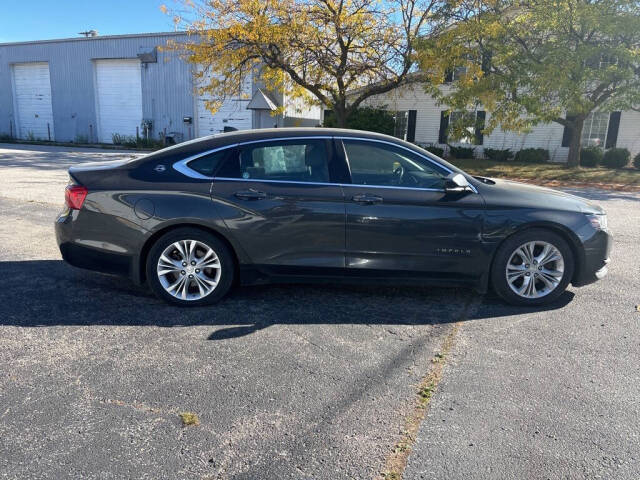 2014 Chevrolet Impala for sale at DECKER AUTO SALES in Bay City, MI