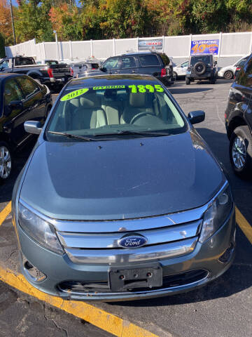 2012 Ford Fusion Hybrid for sale at Ramstroms Service Center in Worcester MA
