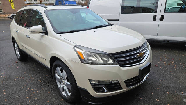 2014 Chevrolet Traverse for sale at RENOS AUTO SALES LLC in Waterbury, CT