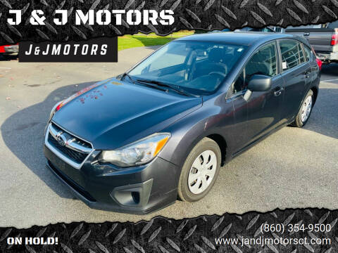 2014 Subaru Impreza for sale at J & J MOTORS in New Milford CT