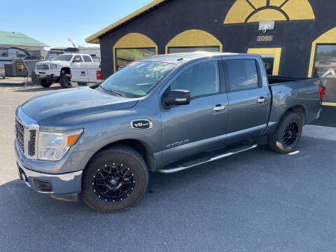 2017 Nissan Titan for sale at BELOW BOOK AUTO SALES in Idaho Falls ID