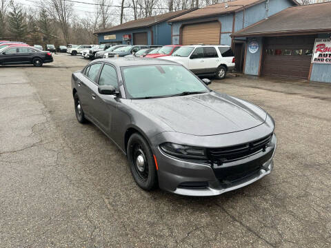 2016 Dodge Charger for sale at Rombaugh's Auto Sales in Battle Creek MI