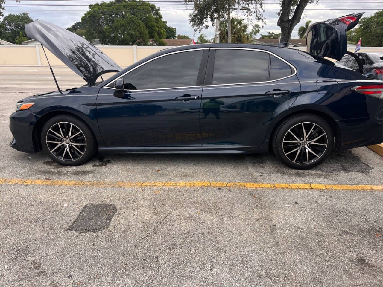 2019 Toyota Camry for sale at M & J UNITED AUTO SALES in LAUDERDALE LAKES, FL