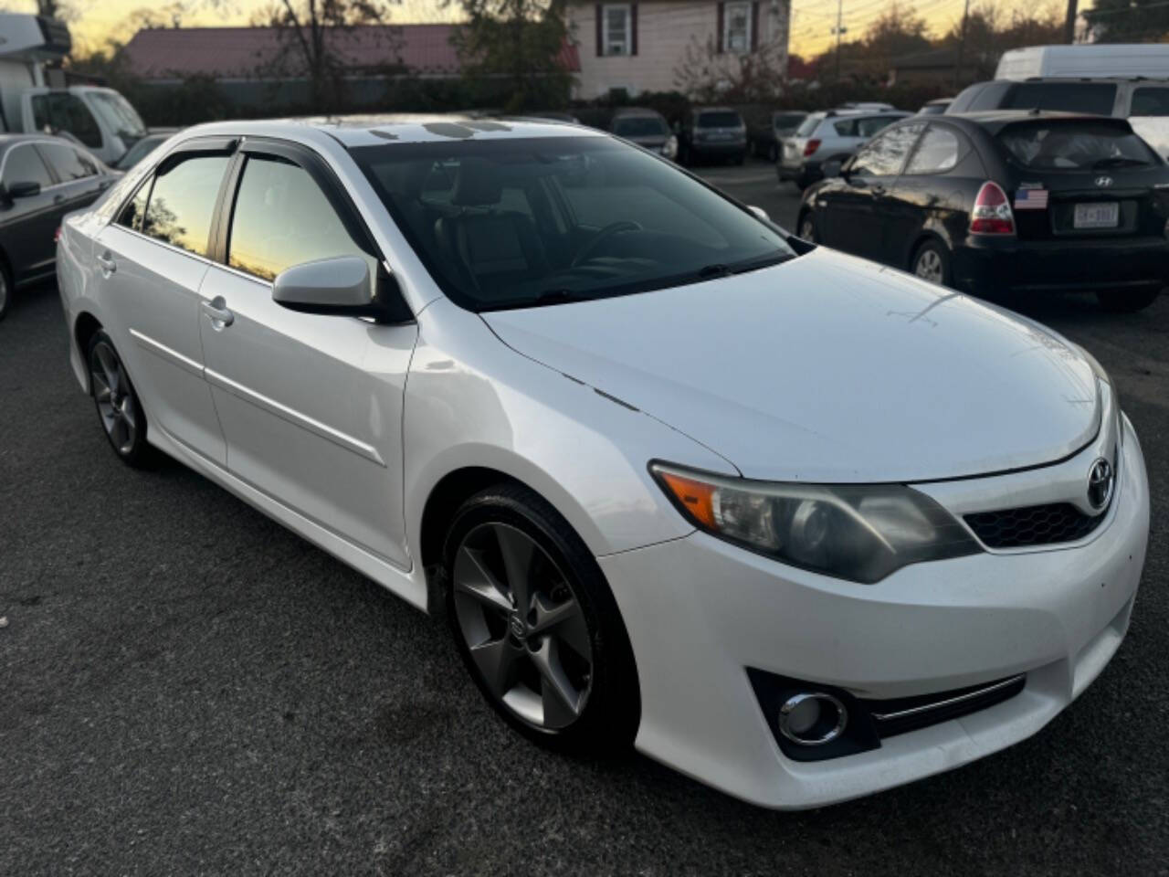 2014 Toyota Camry for sale at Walkem Autos in District Heights, MD