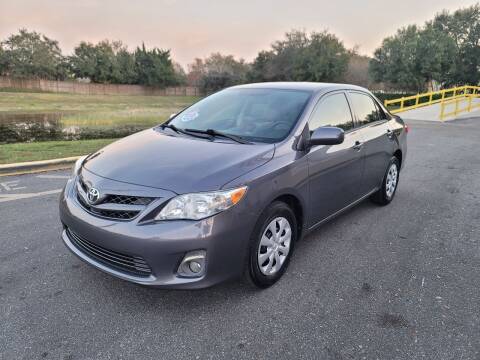 2013 Toyota Corolla for sale at Carcoin Auto Sales in Orlando FL