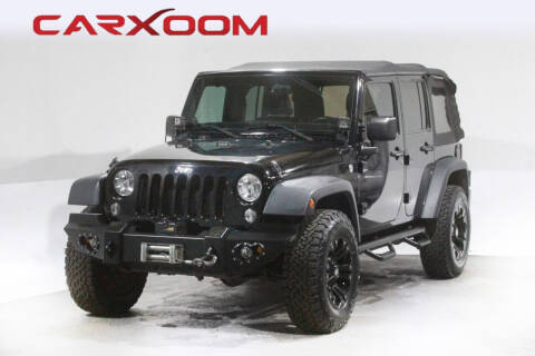 2011 Jeep Wrangler Unlimited for sale at CARXOOM in Marietta GA