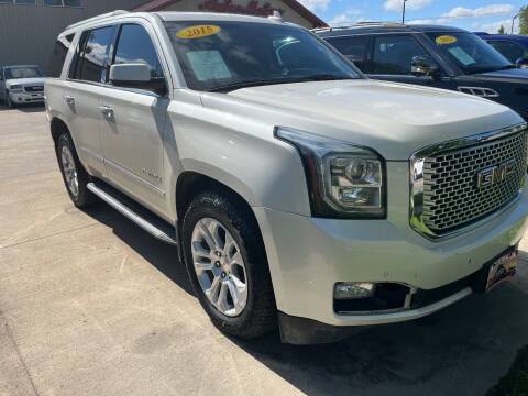 2015 GMC Yukon for sale at Azteca Auto Sales LLC in Des Moines IA