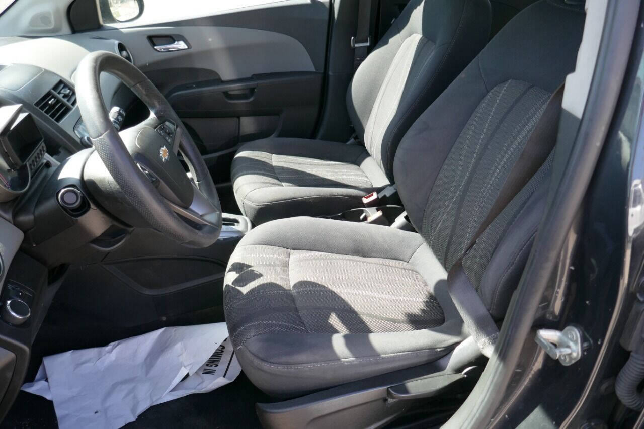 Preowned 2014 Chevrolet Sonic LT Auto 4dr Hatchback for sale by Crazy Cheap Cars in Oakfield, NY