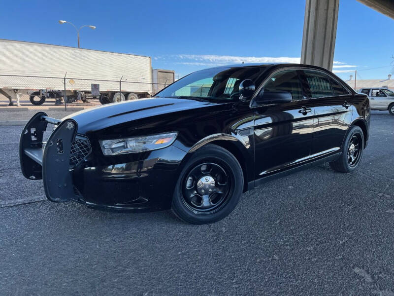 2014 Ford Taurus for sale at MT Motor Group LLC in Phoenix AZ