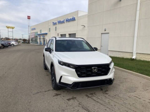 2024 Honda CR-V Hybrid for sale at Tom Wood Honda in Anderson IN