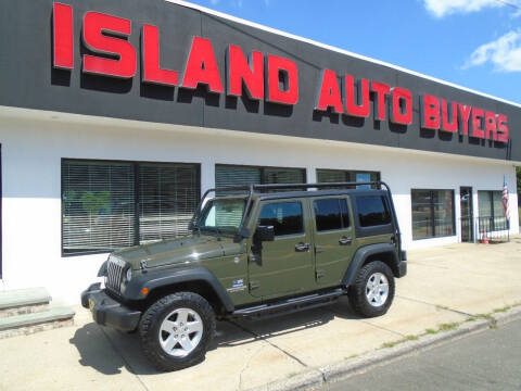 2015 Jeep Wrangler Unlimited for sale at Island Auto Buyers in West Babylon NY