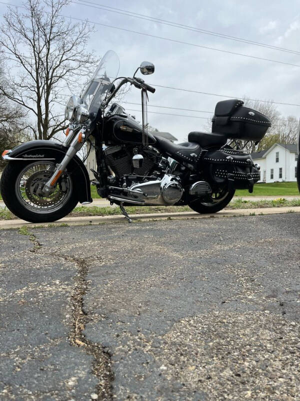 2015 Harley-Davidson FLSTC for sale at Rombaugh's Auto Sales in Battle Creek MI