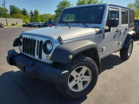 2012 Jeep Wrangler Unlimited for sale at Cruisin' Auto Sales in Madison IN