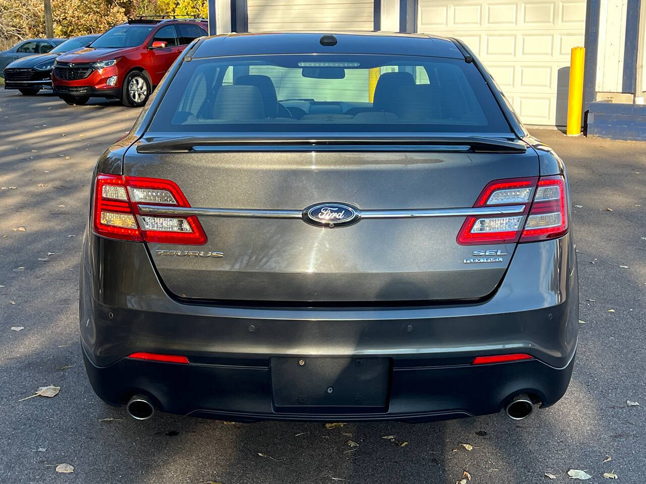 2015 Ford Taurus for sale at Spartan Elite Auto Group LLC in Lansing, MI