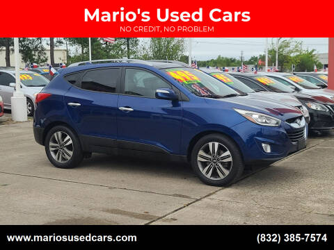 2014 Hyundai Tucson for sale at Mario's Used Cars in Houston TX