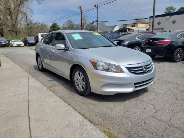 2012 Honda Accord for sale at DAGO'S AUTO SALES LLC in Dalton, GA