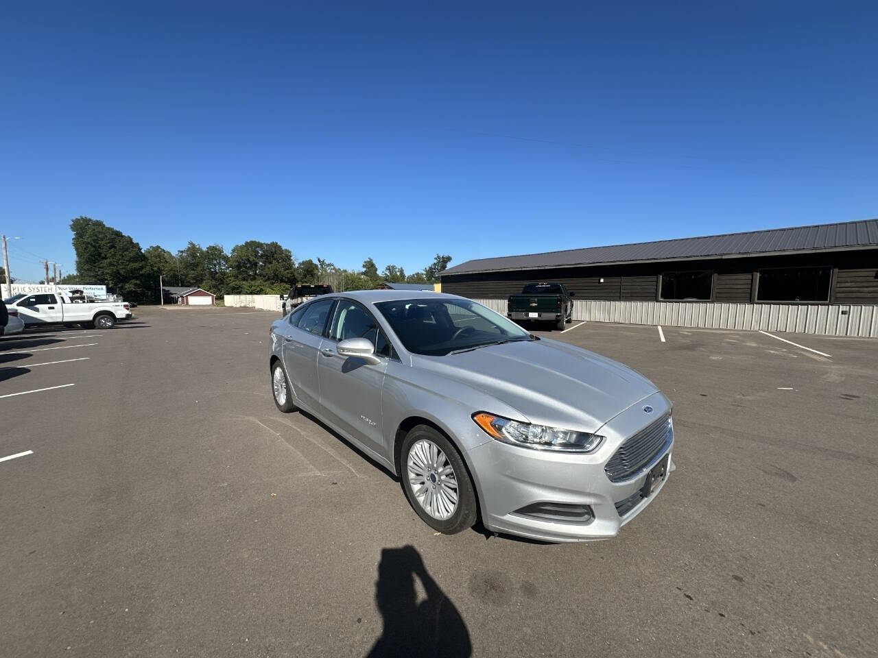 2016 Ford Fusion Hybrid for sale at Auto Hunter in Webster, WI