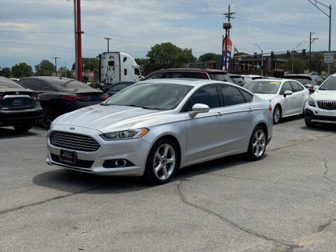 2014 Ford Fusion for sale at El Chapin Auto Sales, LLC. in Omaha NE