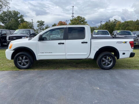 2015 Nissan Titan for sale at Newcombs Auto Sales in Auburn Hills MI