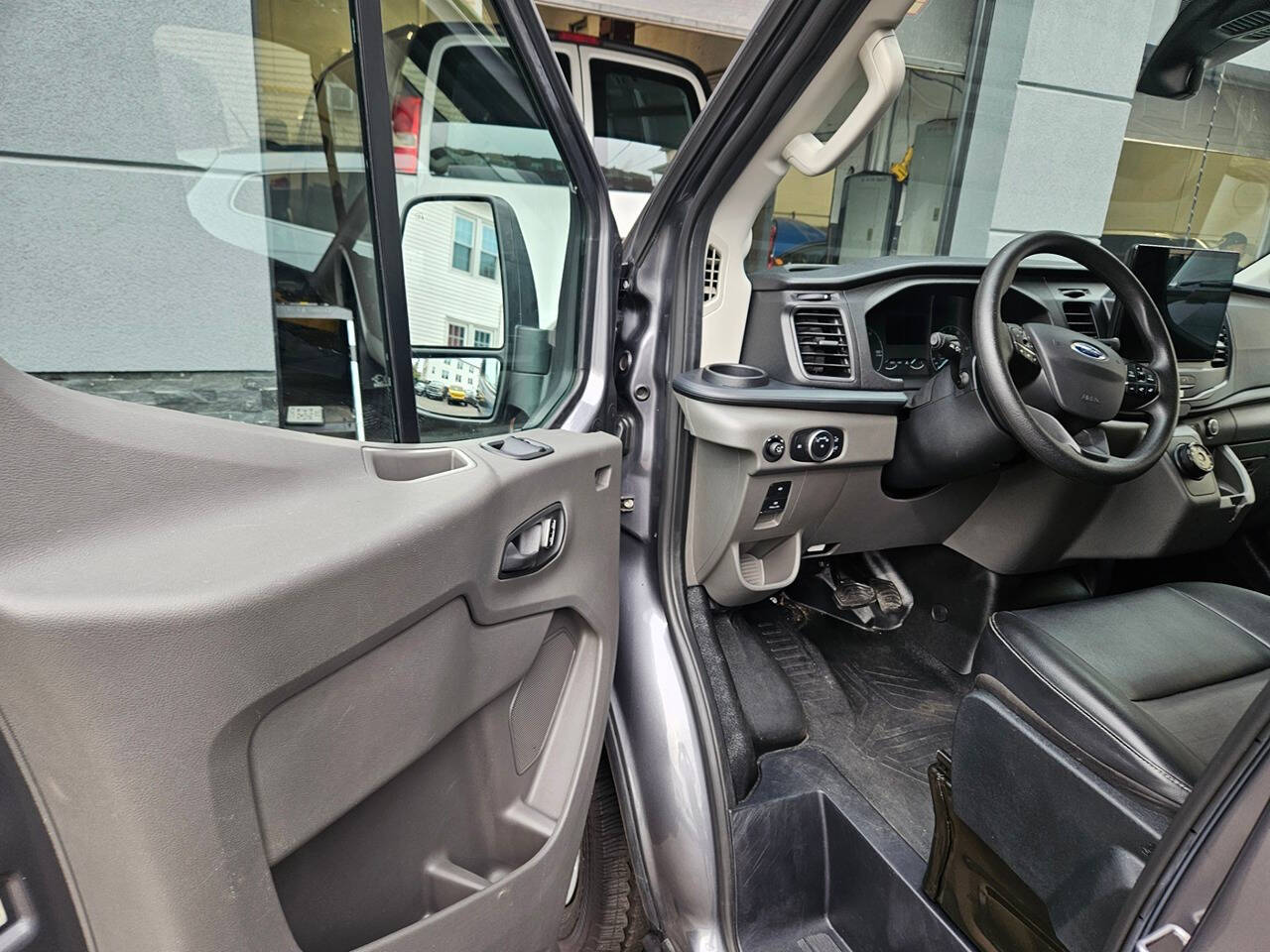 2023 Ford E-Transit for sale at RENOS AUTO SALES LLC in Waterbury, CT