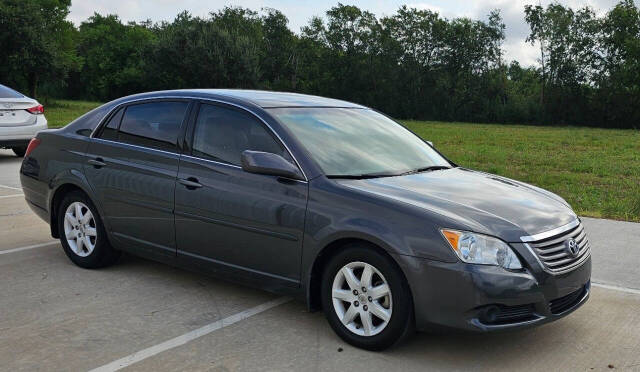 2009 Toyota Avalon for sale at CAR MARKET AUTO GROUP in Sugar Land, TX