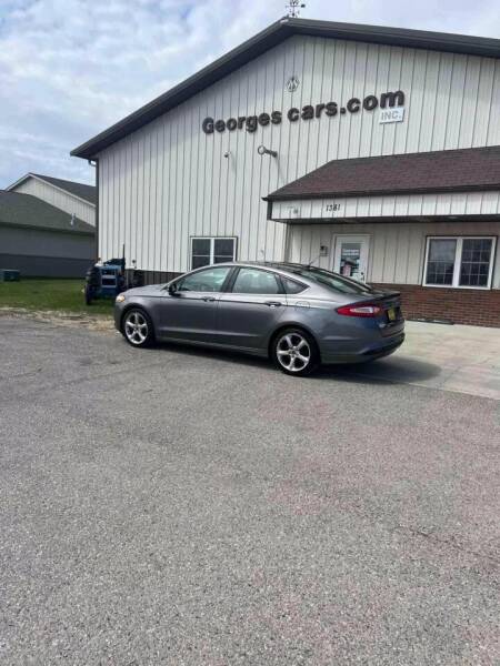 2013 Ford Fusion for sale at GEORGE'S CARS.COM INC in Waseca MN
