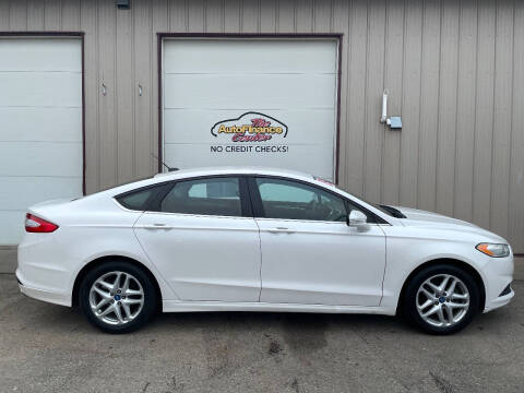 2013 Ford Fusion for sale at The AutoFinance Center in Rochester MN