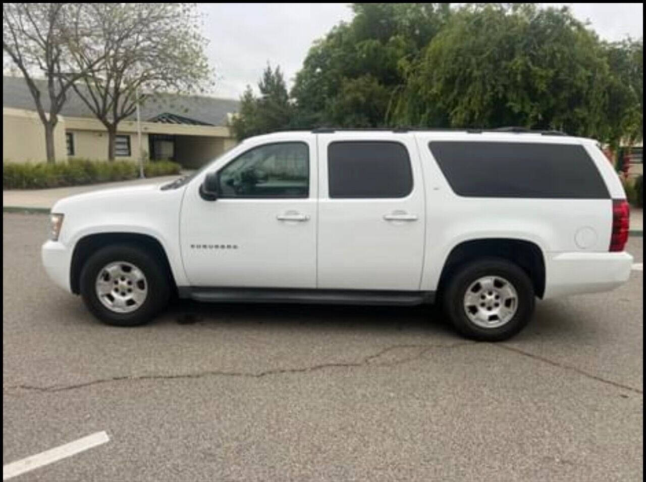 2012 Chevrolet Suburban for sale at AUTO 4 LESS in Fresno, CA