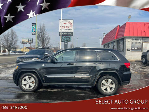 2011 Jeep Grand Cherokee for sale at Select Auto Group in Wyoming MI