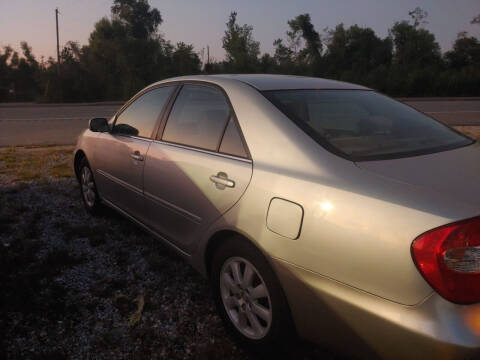 2003 Toyota Camry for sale at Finish Line Auto LLC in Luling LA