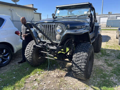 1985 Jeep CJ-7 for sale at SCOTT HARRISON MOTOR CO in Houston TX