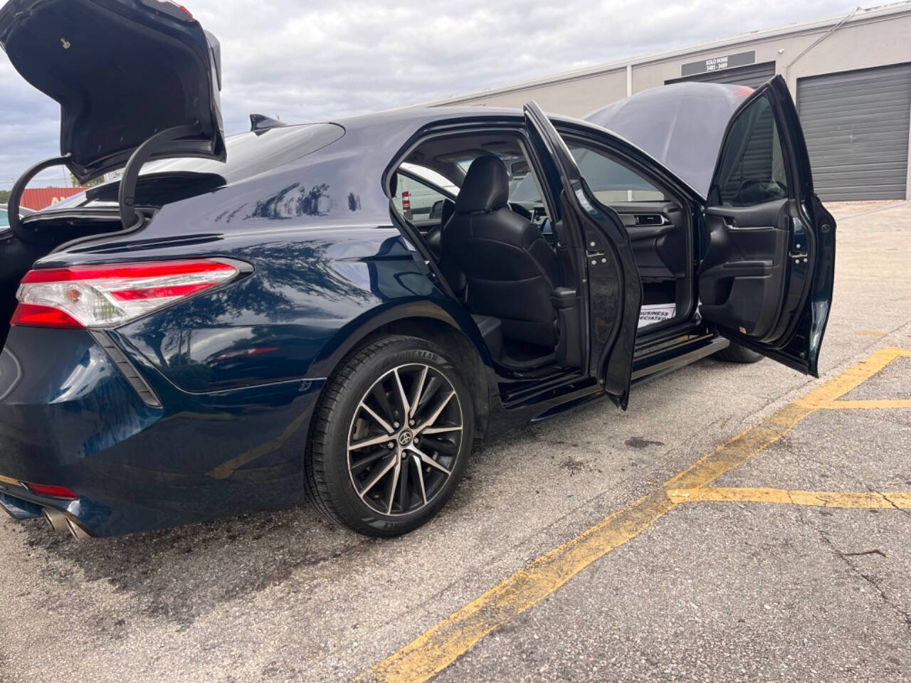 2019 Toyota Camry for sale at M & J UNITED AUTO SALES in LAUDERDALE LAKES, FL