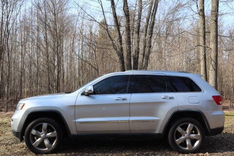 2011 Jeep Grand Cherokee for sale at KT Automotive in West Olive MI
