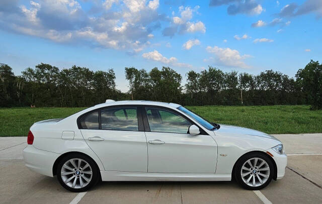 2011 BMW 3 Series for sale at CAR MARKET AUTO GROUP in Sugar Land, TX