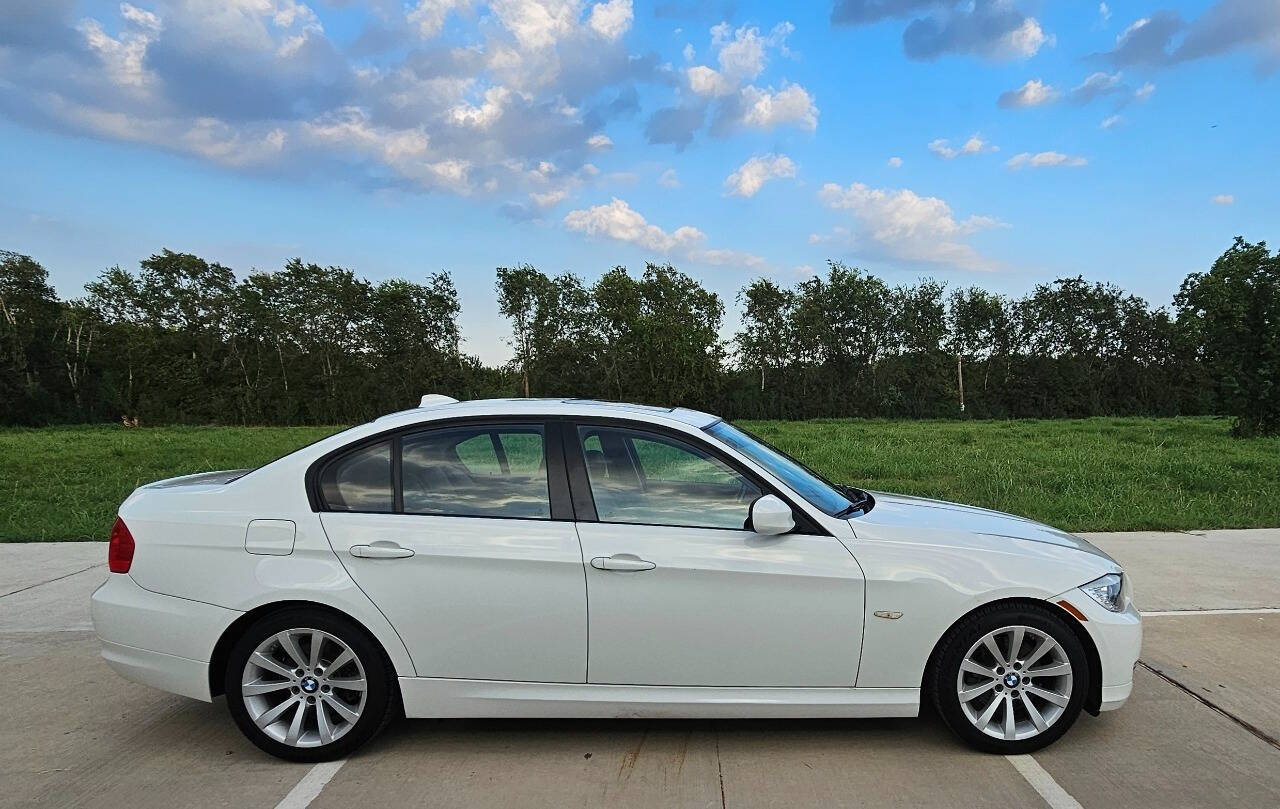 2011 BMW 3 Series for sale at CAR MARKET AUTO GROUP in Sugar Land, TX