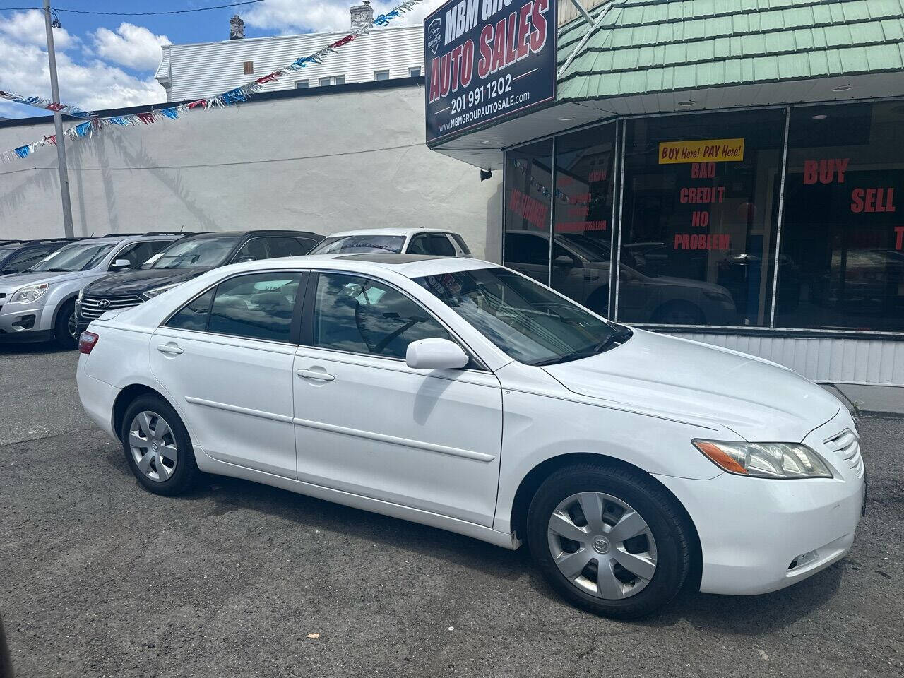 2009 Toyota Camry for sale at MBM Group LLC Auto Sales in Kearny, NJ