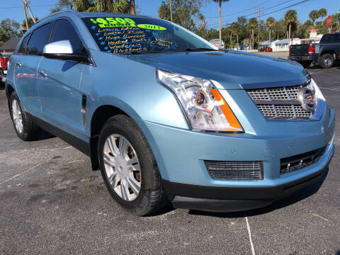 2011 Cadillac SRX for sale at RIVERSIDE MOTORCARS INC - Main Lot in New Smyrna Beach FL