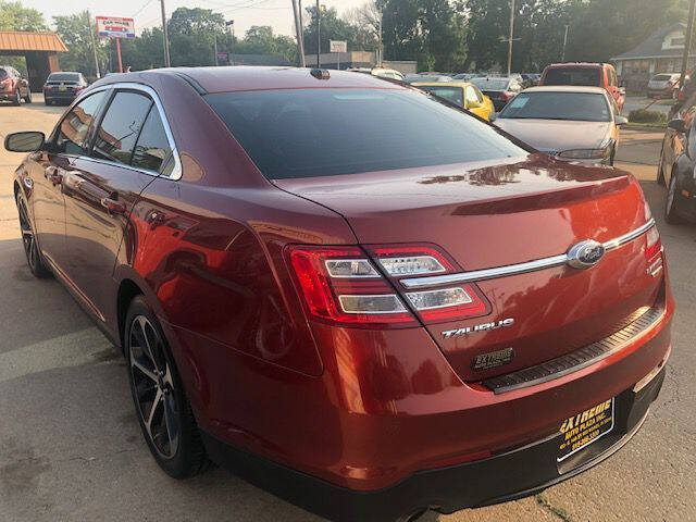 2014 Ford Taurus for sale at Extreme Auto Plaza in Des Moines, IA