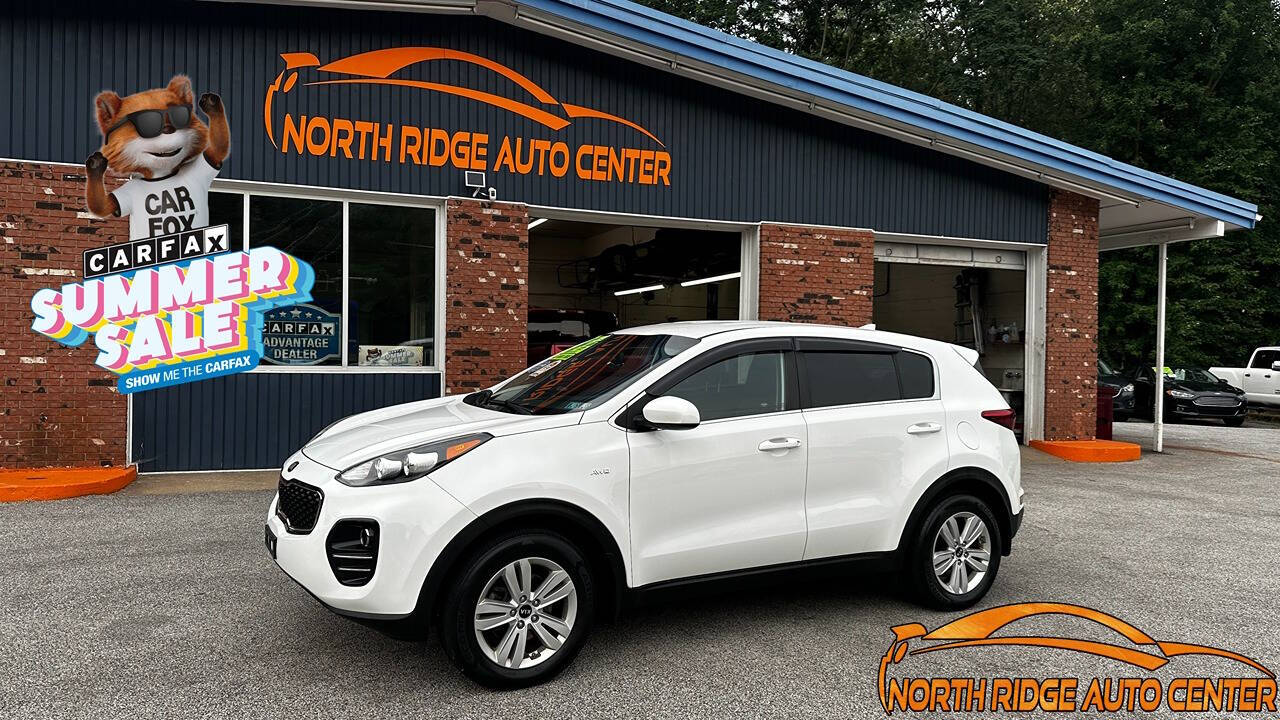 2017 Kia Sportage for sale at North Ridge Auto Center LLC in Madison, OH