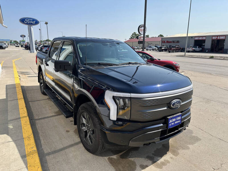 Used 2023 Ford F-150 Lightning XLT with VIN 1FT6W1EV9PWG38449 for sale in Saint Paul, NE