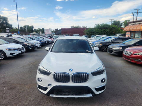 2017 BMW X1 for sale at SANAA AUTO SALES LLC in Englewood CO