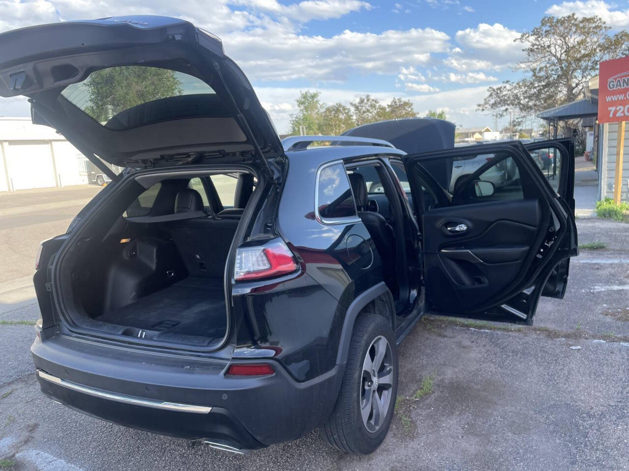 2019 Jeep Cherokee for sale at Ganda Auto Sales in Denver, CO