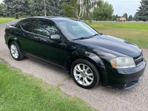 2013 Dodge Avenger for sale at BELOW BOOK AUTO SALES in Idaho Falls ID