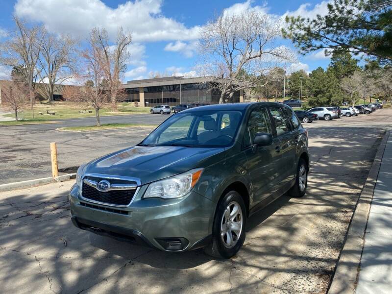 2014 Subaru Forester for sale at QUEST MOTORS in Englewood CO