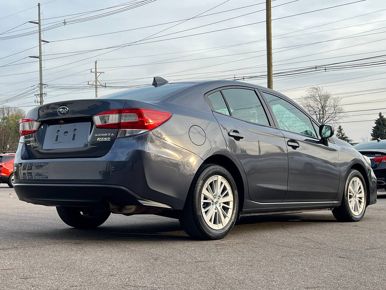 2017 Subaru Impreza for sale at Spartan Elite Auto Group LLC in Lansing, MI