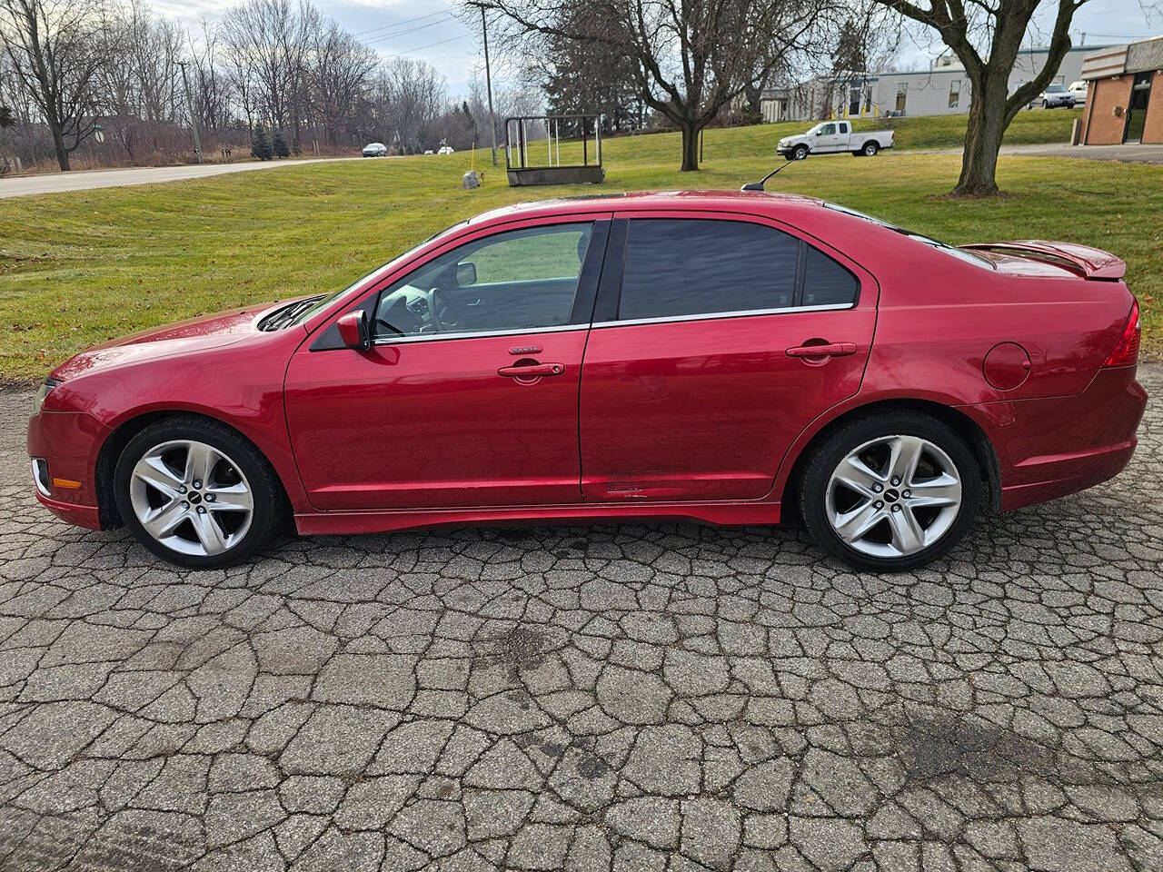 2011 Ford Fusion for sale at WAGNER AUTO MART LLC in Ann Arbor, MI