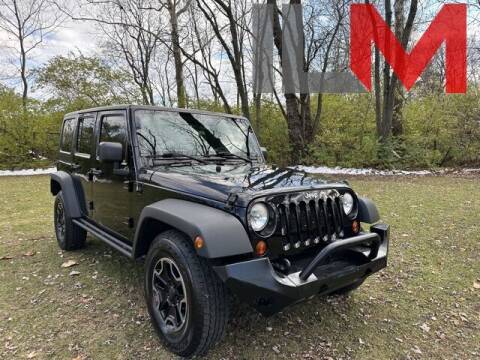2012 Jeep Wrangler Unlimited for sale at INDY LUXURY MOTORSPORTS in Fishers IN