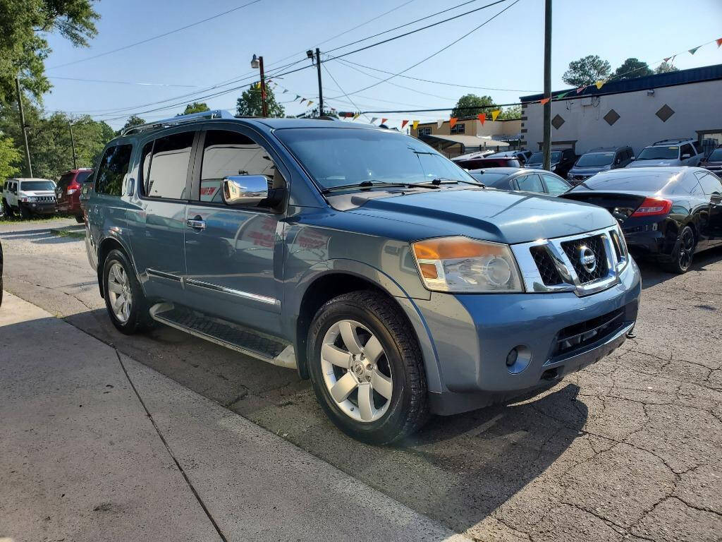 2010 Nissan Armada for sale at DAGO'S AUTO SALES LLC in Dalton, GA